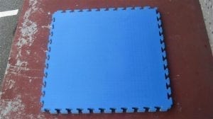 Elite grade jigsaw mat 1m x 1m x 40 mm high density martial art flooring . Anti abrassive skin excellent feedback and shock absorption